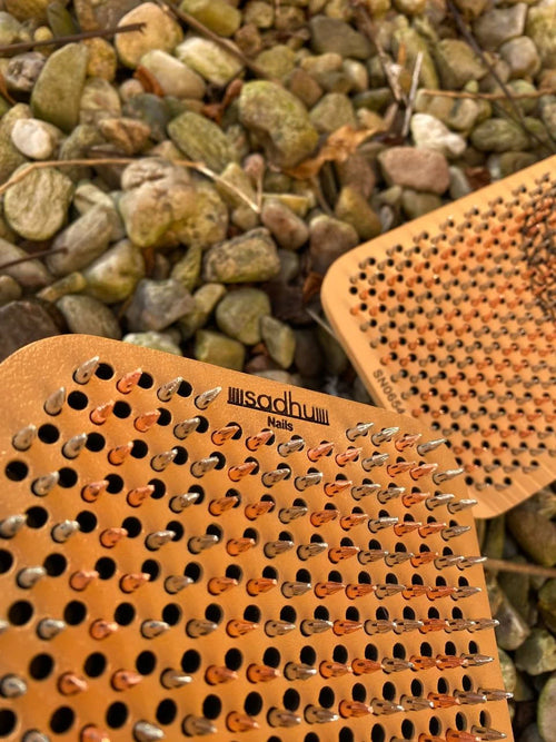 Rubber Sadhu board with metal nails – close-up of nail bed