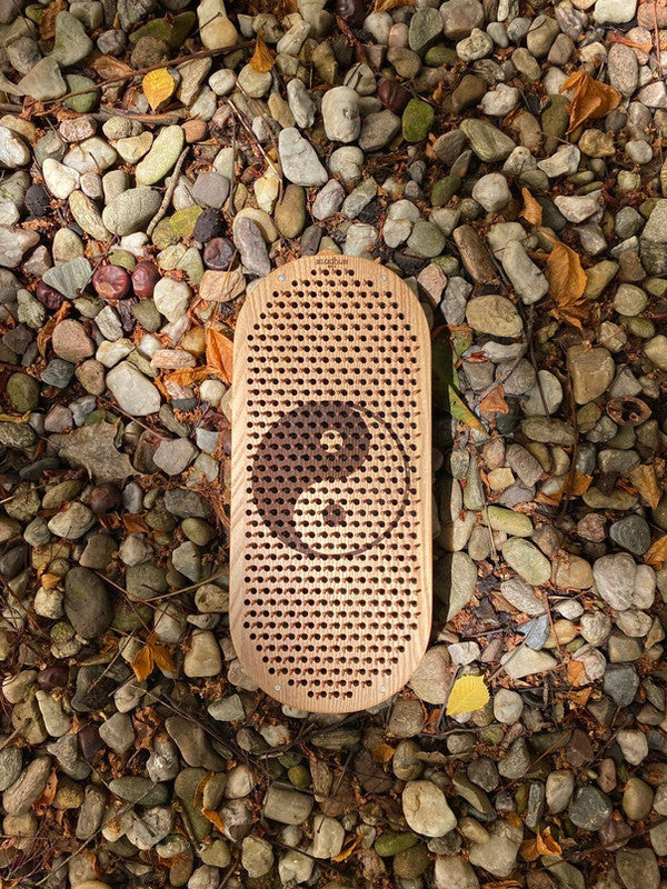 Wooden board with metal nails
