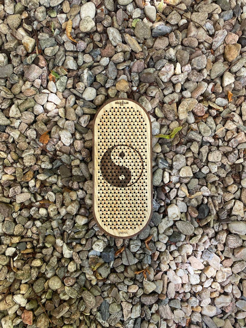 Wooden board with metal nails