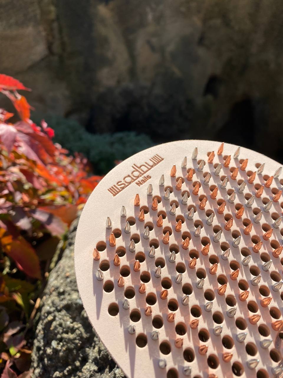 Flexible rubber board with metal nails